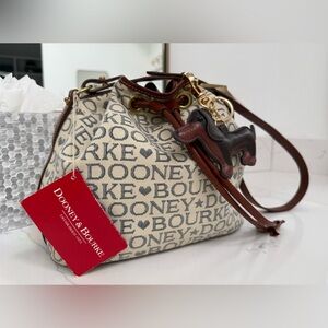 Dooney & Bourke Ivory and Brown Bucket Bag with Dachshund Leather Charm